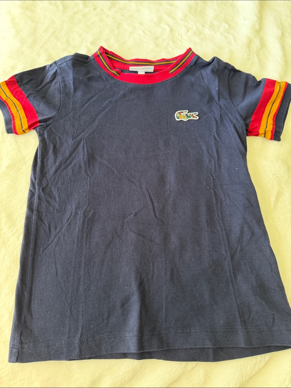 Boys Lacoste Navy Short Sleeve Tee with Red and Yellow Trim